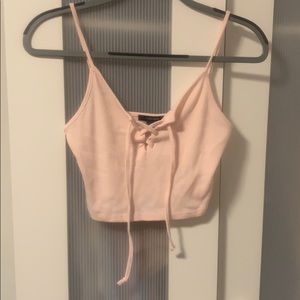 Light pink lace up crop tank